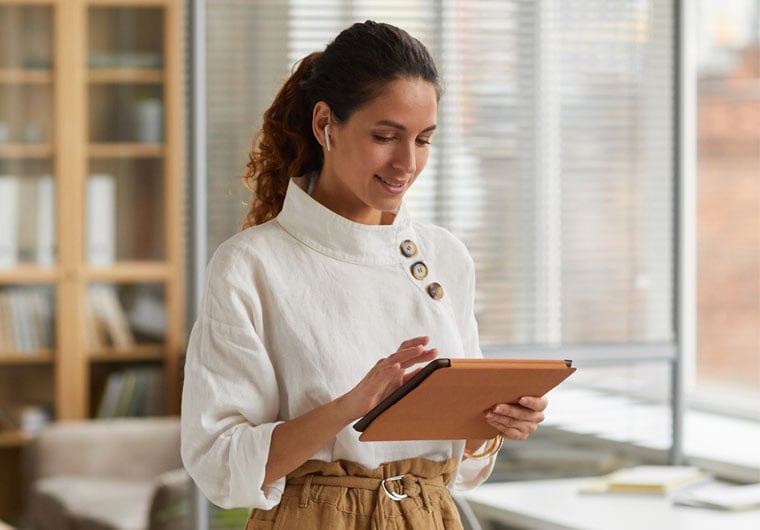 woman working on tablet