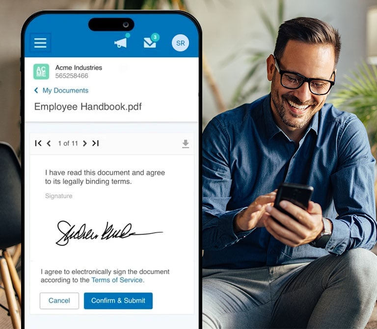 An employee signing documents in Paychex Flex