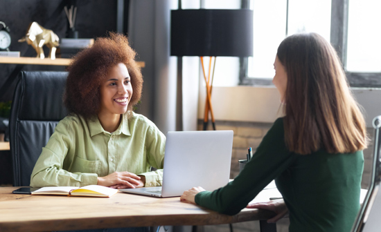 Business meeting between two individuals