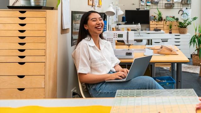 an employee working at a sewing machine