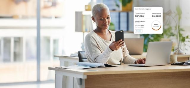 An employee looking at her 401k savings