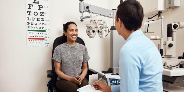 Woman in an optometrist visit, talking to the doctor