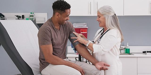 men in a doctor appointment