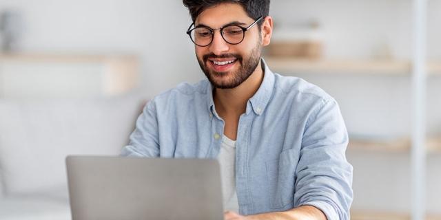 man working on laptop