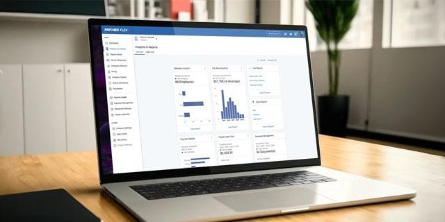 Paychex HR Analytics shown on a laptop