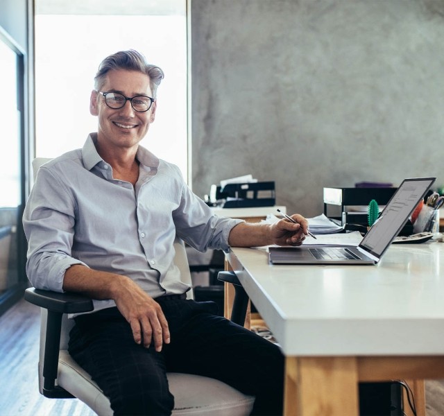 Business owner working on his computer