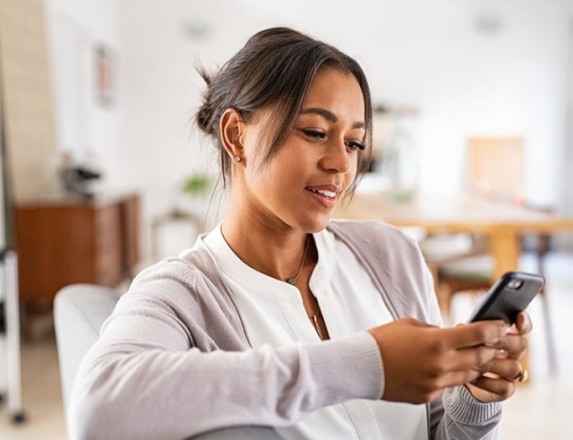 business owner finishing payroll from smartphone