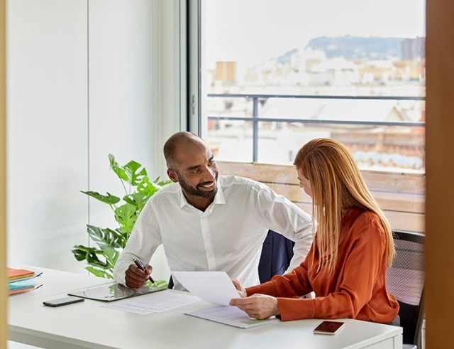 employee with consultant having a session in an office