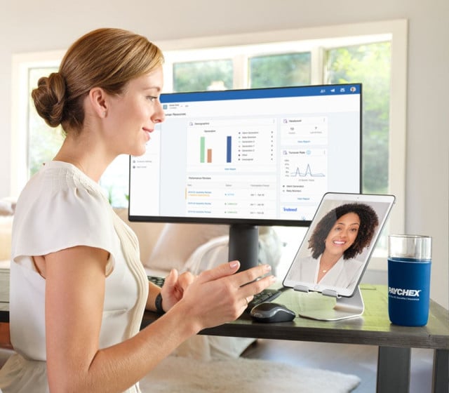 A Paychex HR advisor talking to her client