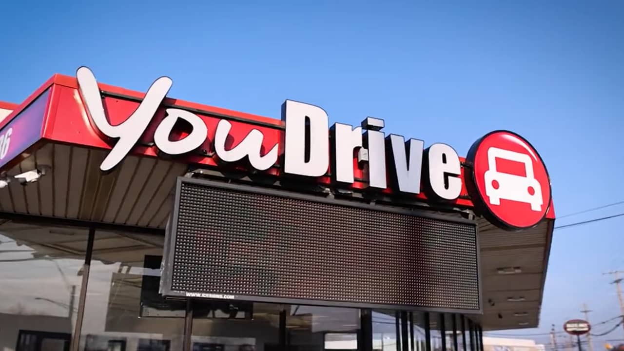 YouDrive Auto Dealership sign