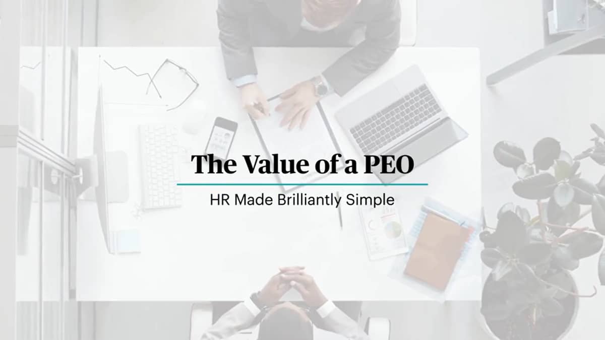 Title stating "The Value of a PEO" over two men seated at desk signing contract